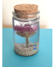 Resin flask containing a real dried thistle